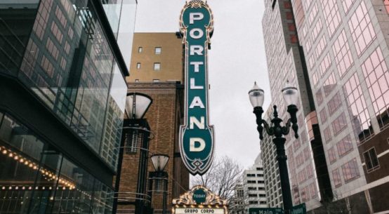 The marquee sign for the Portland Center For The Performing Arts is shown on a downtown Main Street in Portland, Oregon